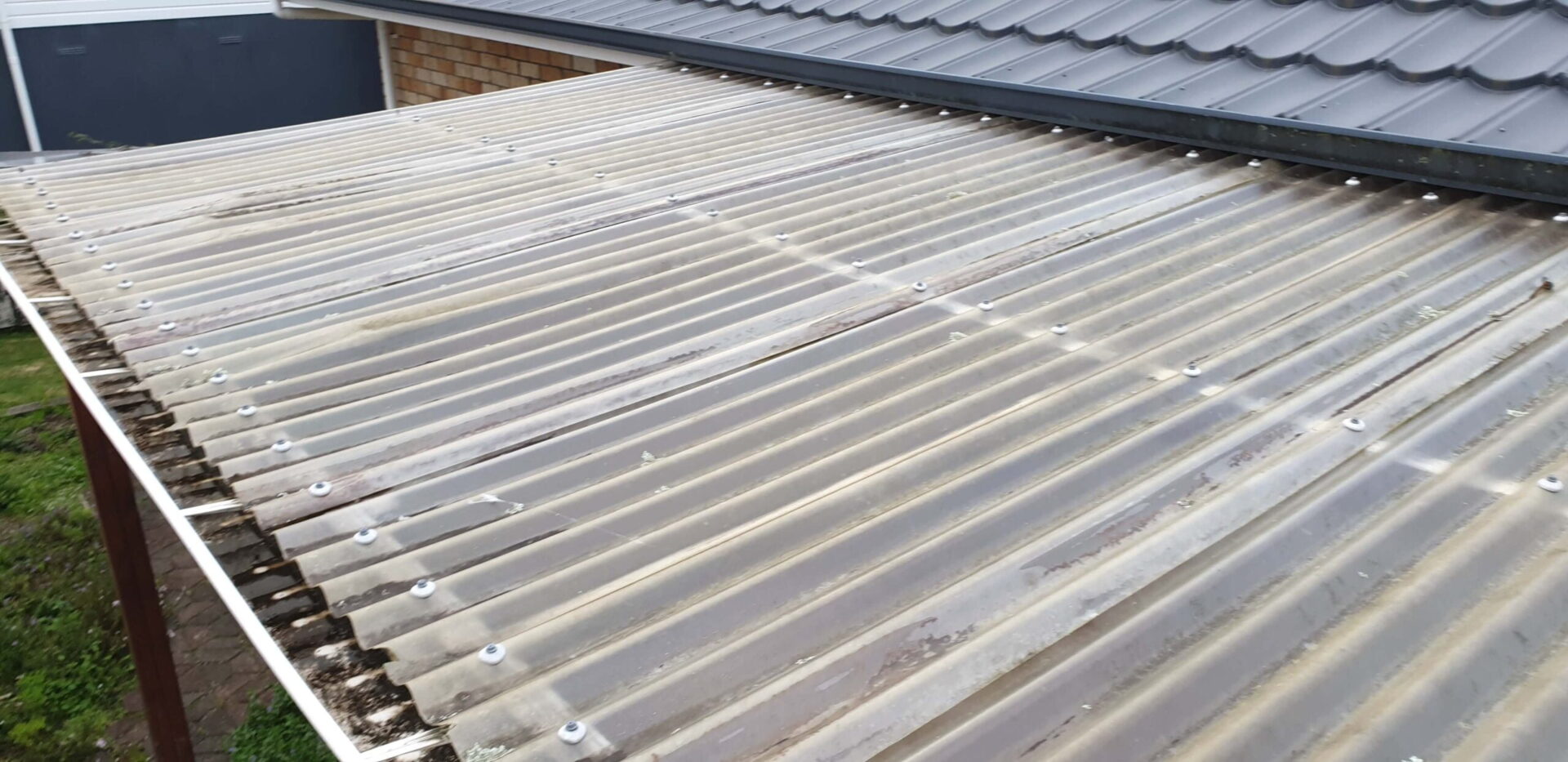 Before DTK Projects and Maintenance installed new polycarbonate sheeting